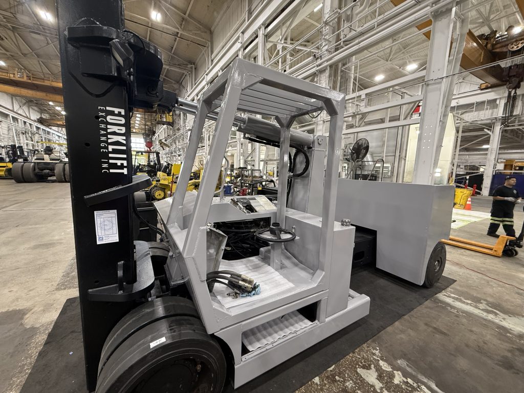 Reassembly of the Versa Lift 40/60 chassis during refurbishment.