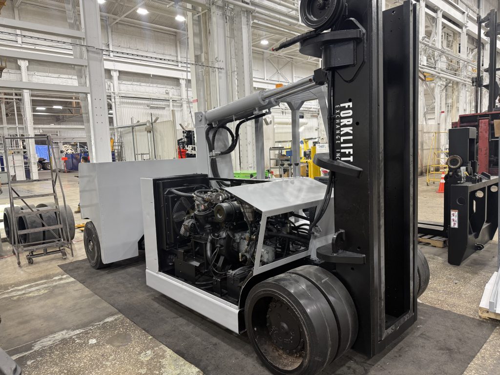 Engine reinstalled during refurbishment of the Versa Lift 40/60.