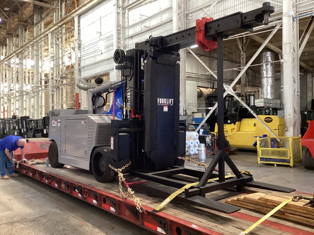 Versa Lift 40/60 secured on trailer for shipment.